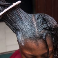 woman-getting-hair--DNYC-RELAXER-TREATMENT-500x500